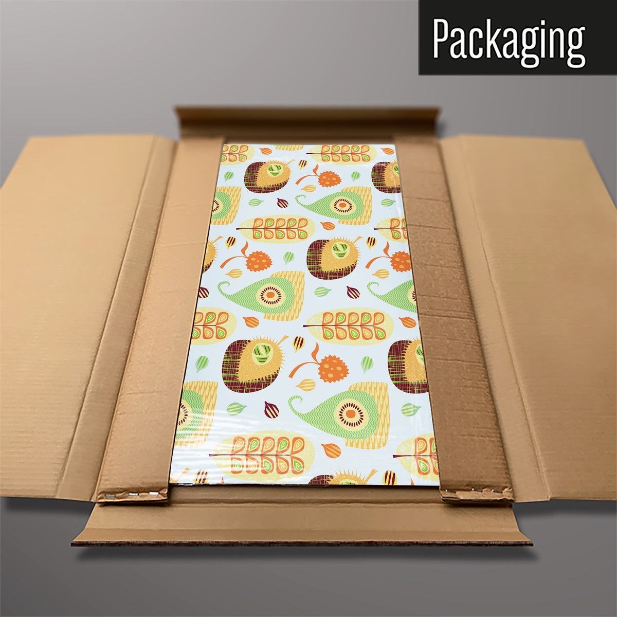 The Exotic Fruit magnetic notice board in Exotic Fruit packed flat in its cardboard box