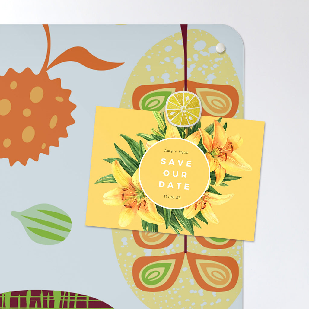 A postcard held by a fridge magnet on the Exotic Fruit magnetic notice board in Exotic Fruit