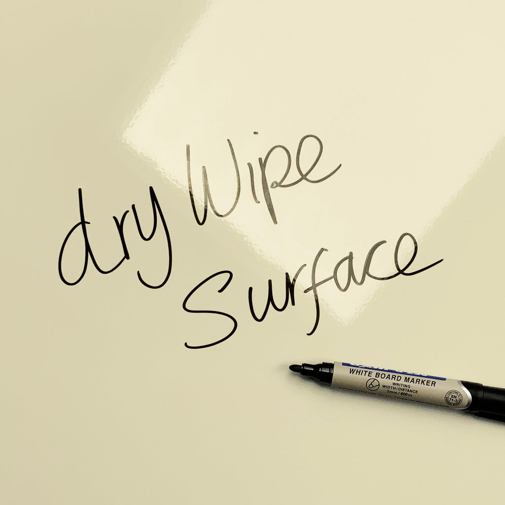 The words dry wipe surface written in marker pen on the Olive/Coral Fair Isle Owl magnetic notice board