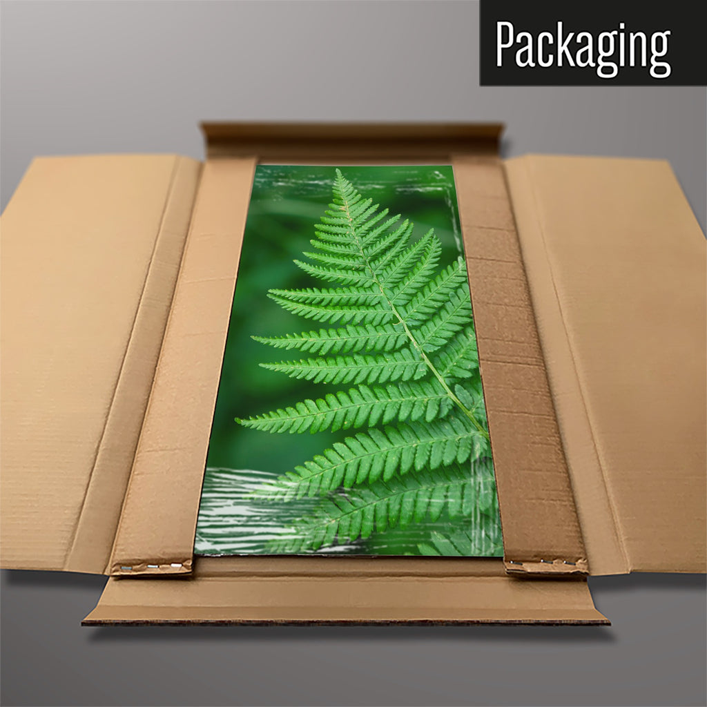 The Fern magnetic notice board packed flat in its cardboard box