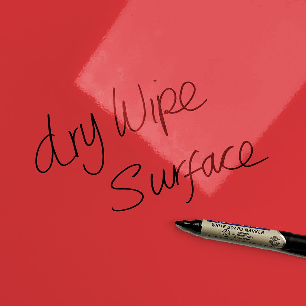The words dry wipe surface written in marker pen on the Union Jack Flags magnetic notice board