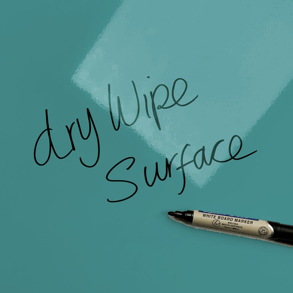 The words dry wipe surface written in marker pen on the blue Gingham Cockerel magnetic notice board