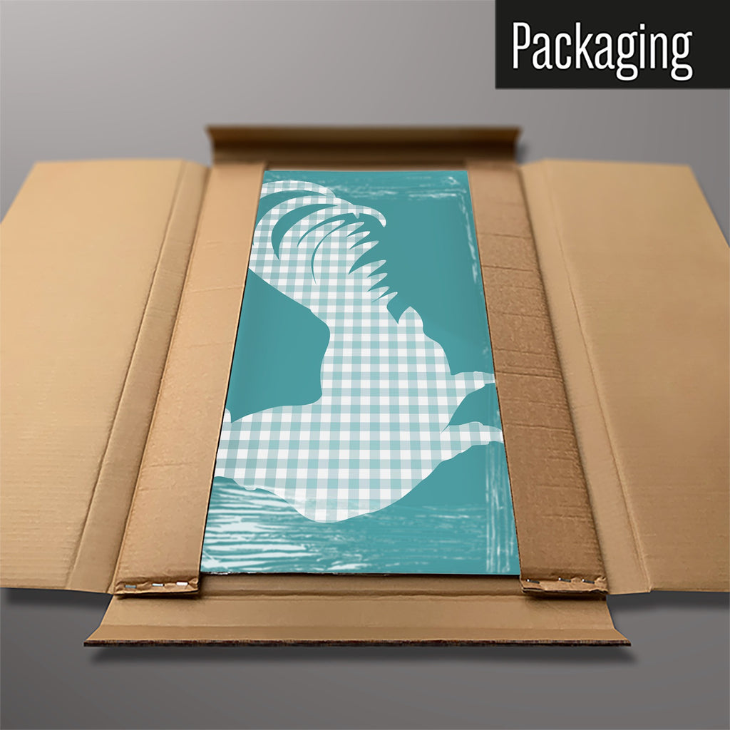 The Gingham Cockerel magnetic notice board in blue packed flat in its cardboard box