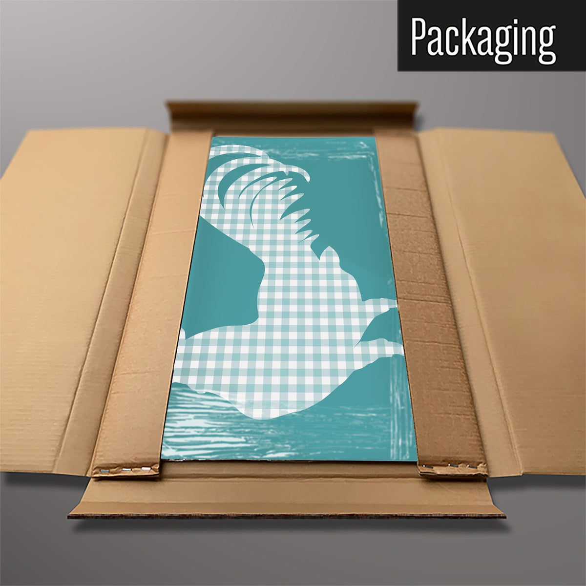 The Gingham Cockerel magnetic notice board in blue packed flat in its cardboard box