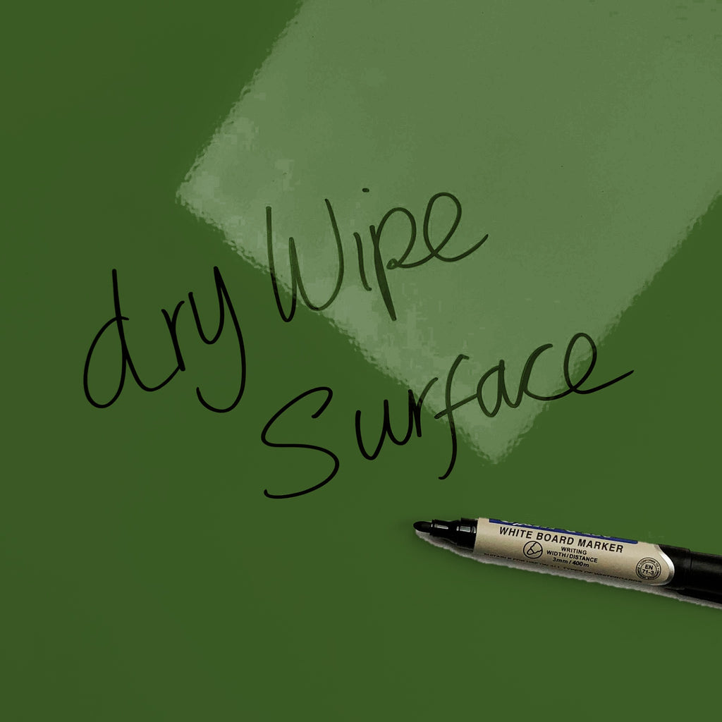 The words dry wipe surface written in marker pen on the Green Leaves magnetic notice board