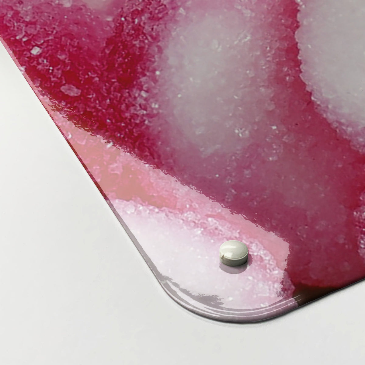 Close-up of the corner of the Heart Sweets magnetic notice board in Heart Sweets, showing the gloss finish and a screw cap
