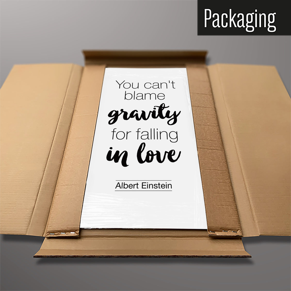 The Inspirational Quote Albert Einstein magnetic notice board in White packed flat in its cardboard box