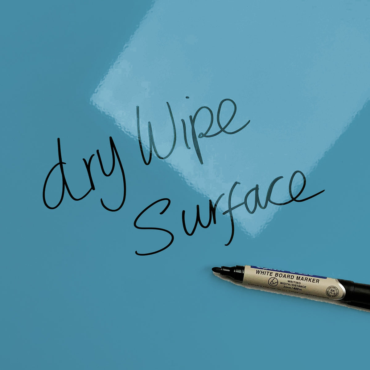 The words dry wipe surface written in marker pen on the Blue Inspirational Quote Lao Tzu magnetic notice board