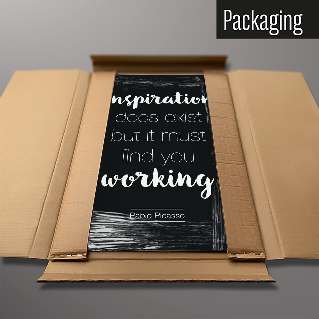 The Inspirational Quote Pablo Picasso magnetic notice board in Dark Blue packed flat in its cardboard box