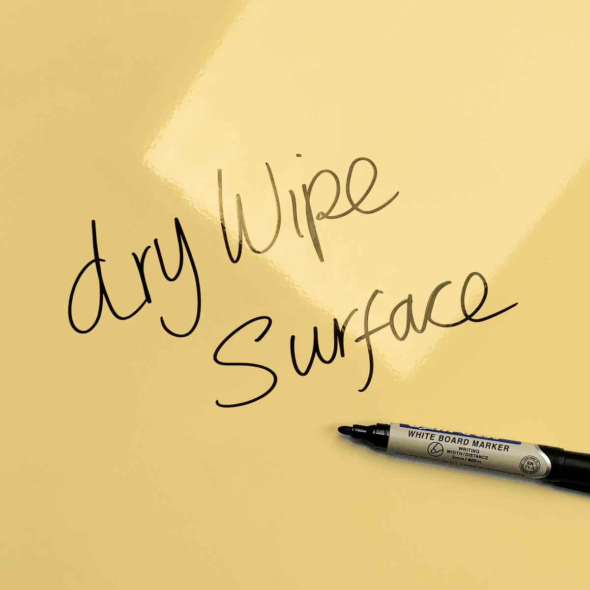 The words dry wipe surface written in marker pen on the Teal Kitchen Disco magnetic notice board