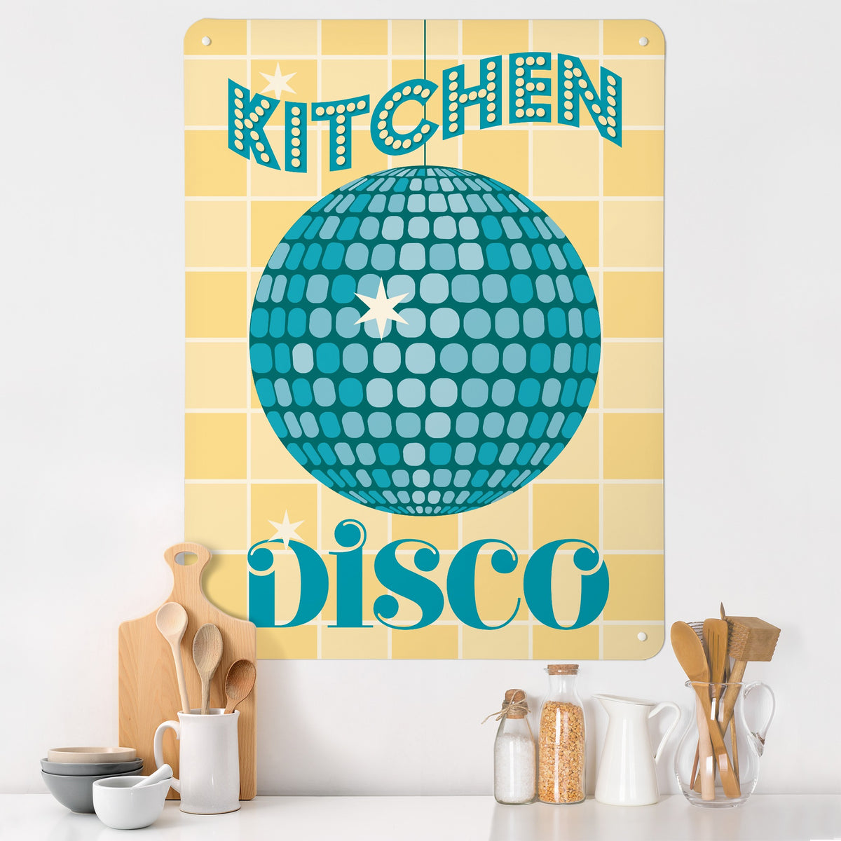 Kitchen Disco magnetic notice board in Teal on a kitchen wall