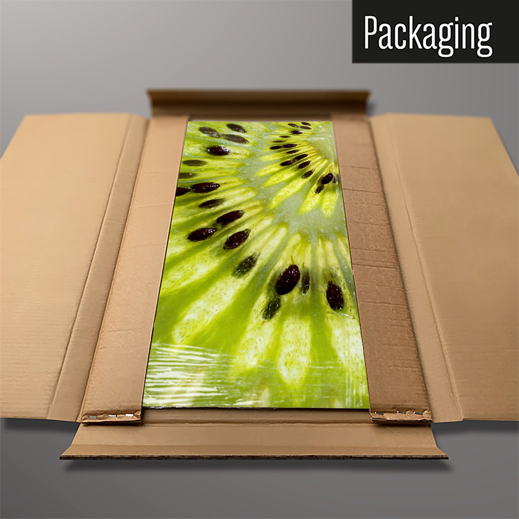 The Kiwi magnetic notice board packed flat in its cardboard box