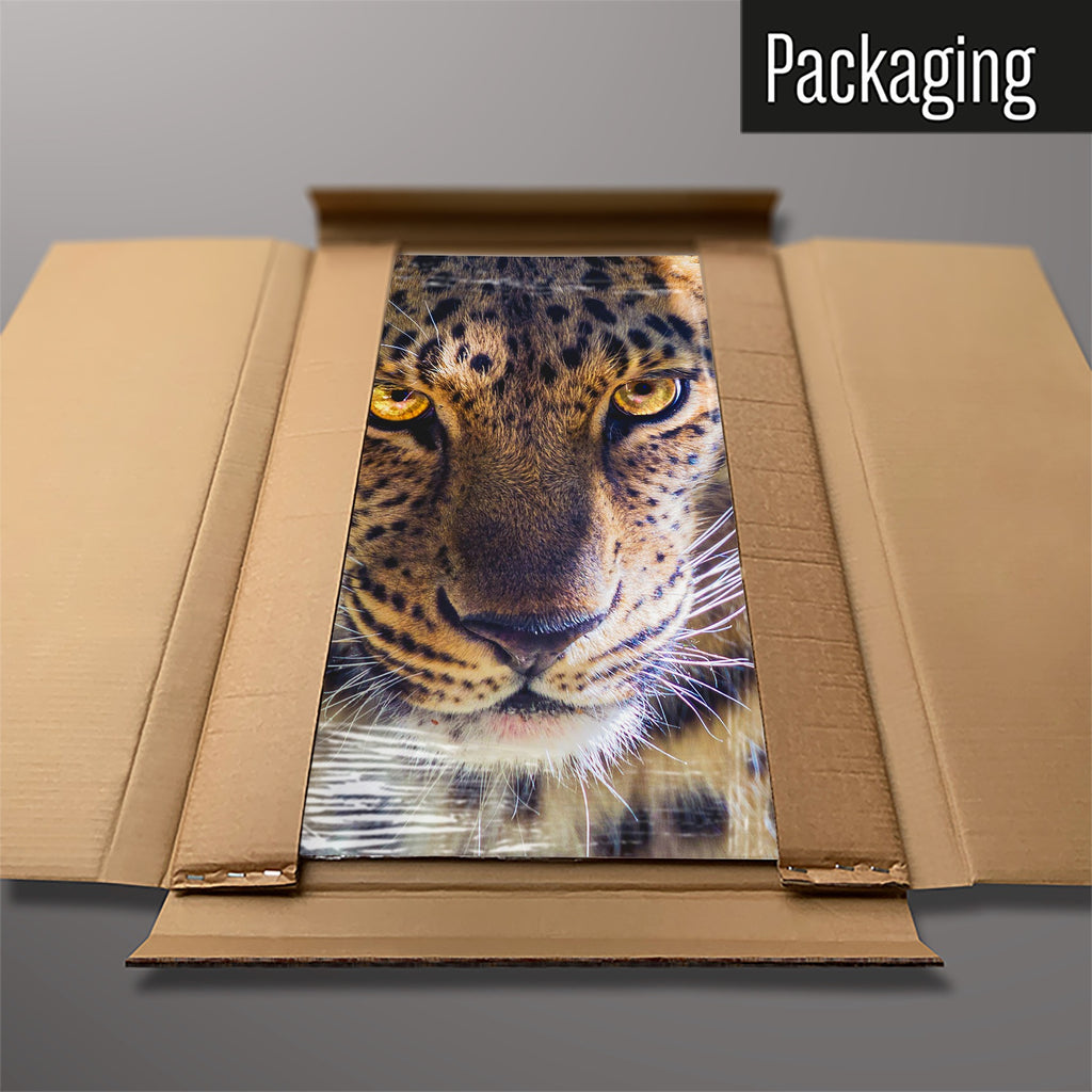 The Leopard Face magnetic notice board packed flat in its cardboard box