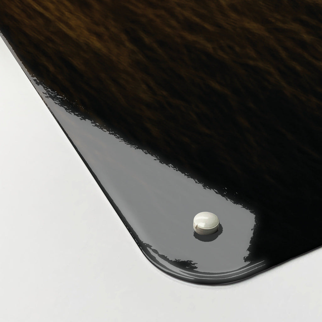 Close-up of the corner of the Lion magnetic notice board, showing the gloss finish and a screw cap