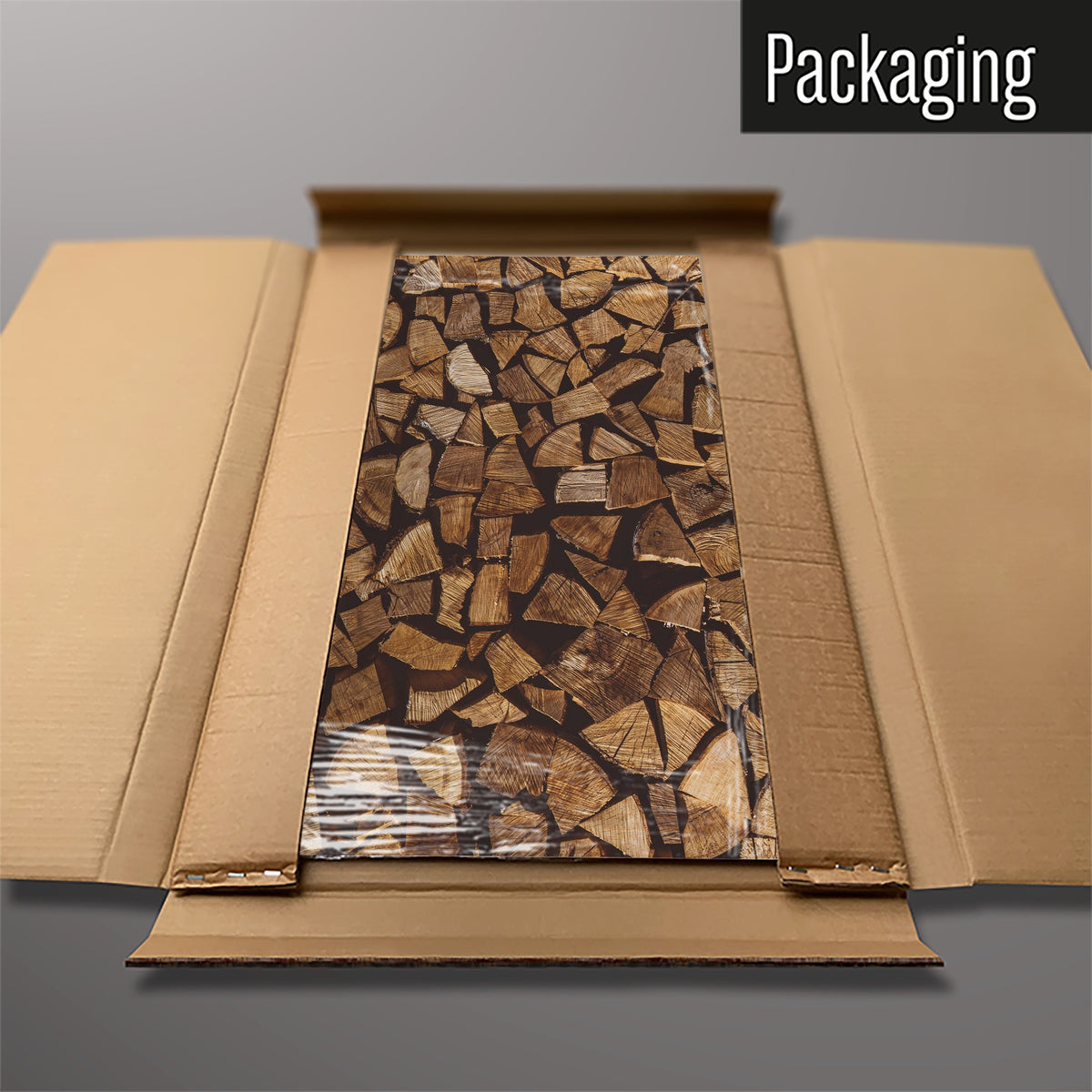 The Log Pile magnetic notice board packed flat in its cardboard box