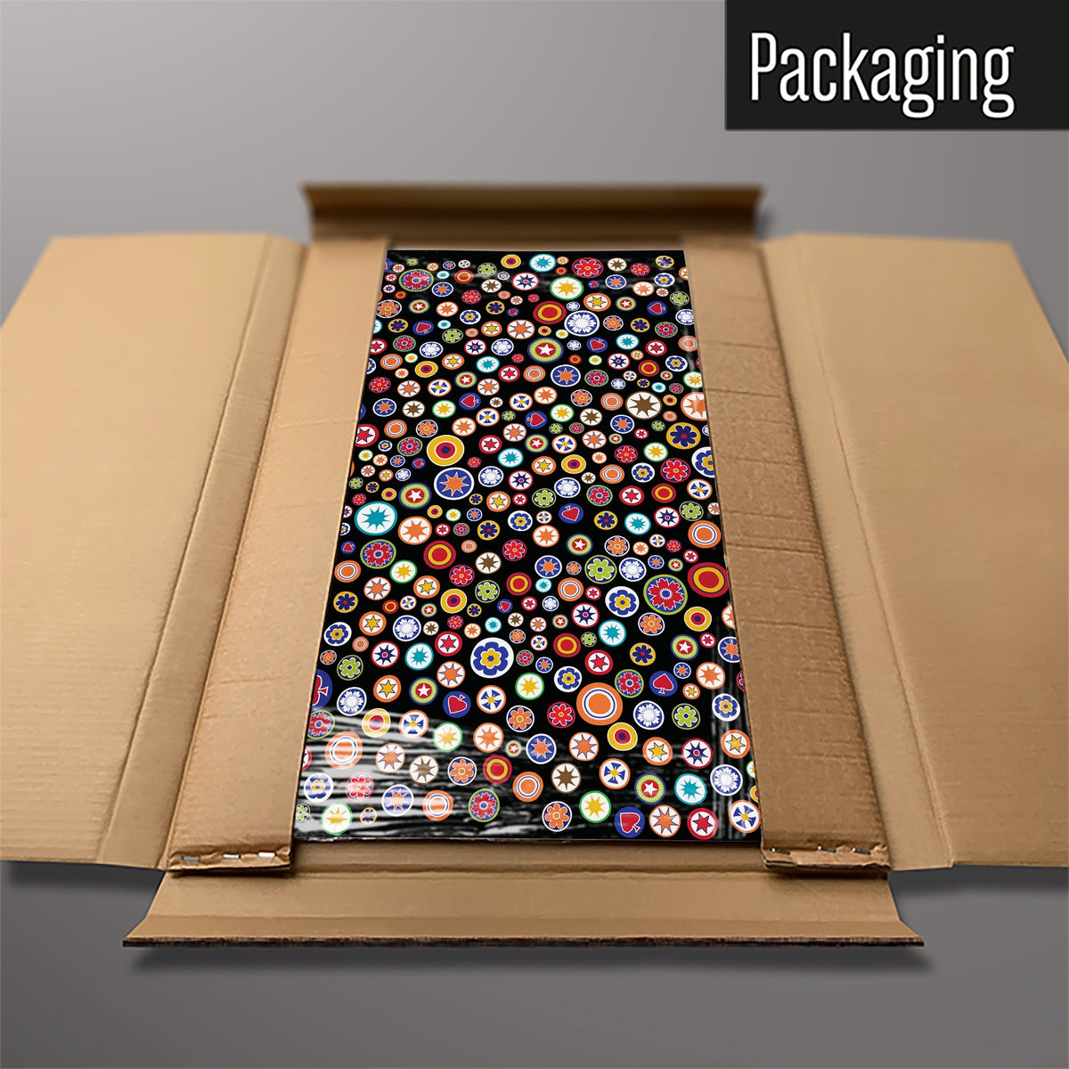 The Millefiori magnetic notice board in Millefiori on Black packed flat in its cardboard box