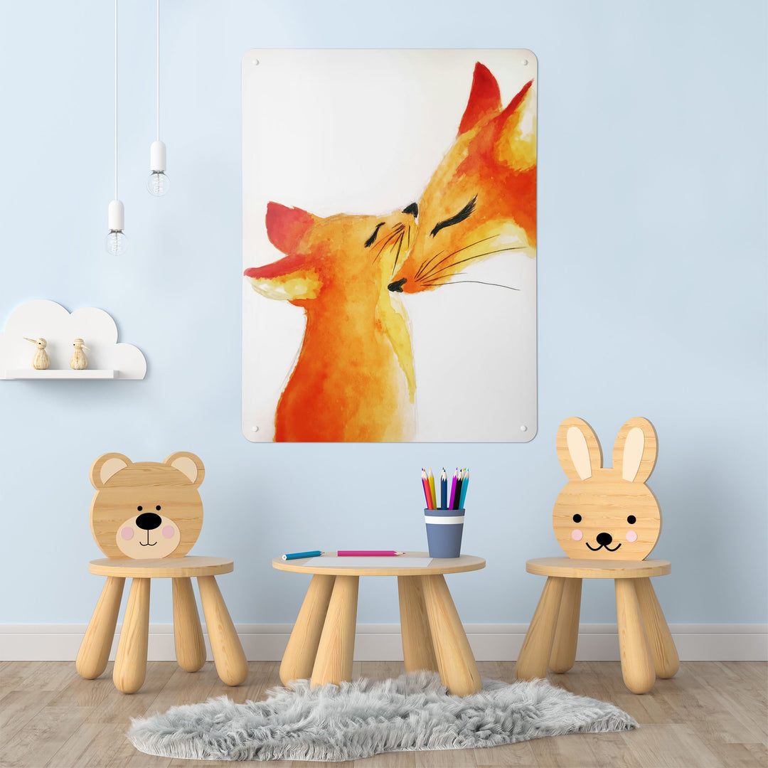 A playroom interior with a magnetic metal wall art panel showing a watercolour painting of a mother fox and her cub