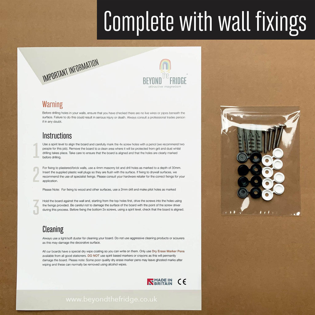 The fixing pack supplied with the Oranges And Lemons magnetic notice board: screws, wall plugs, black and white screw caps and instructions