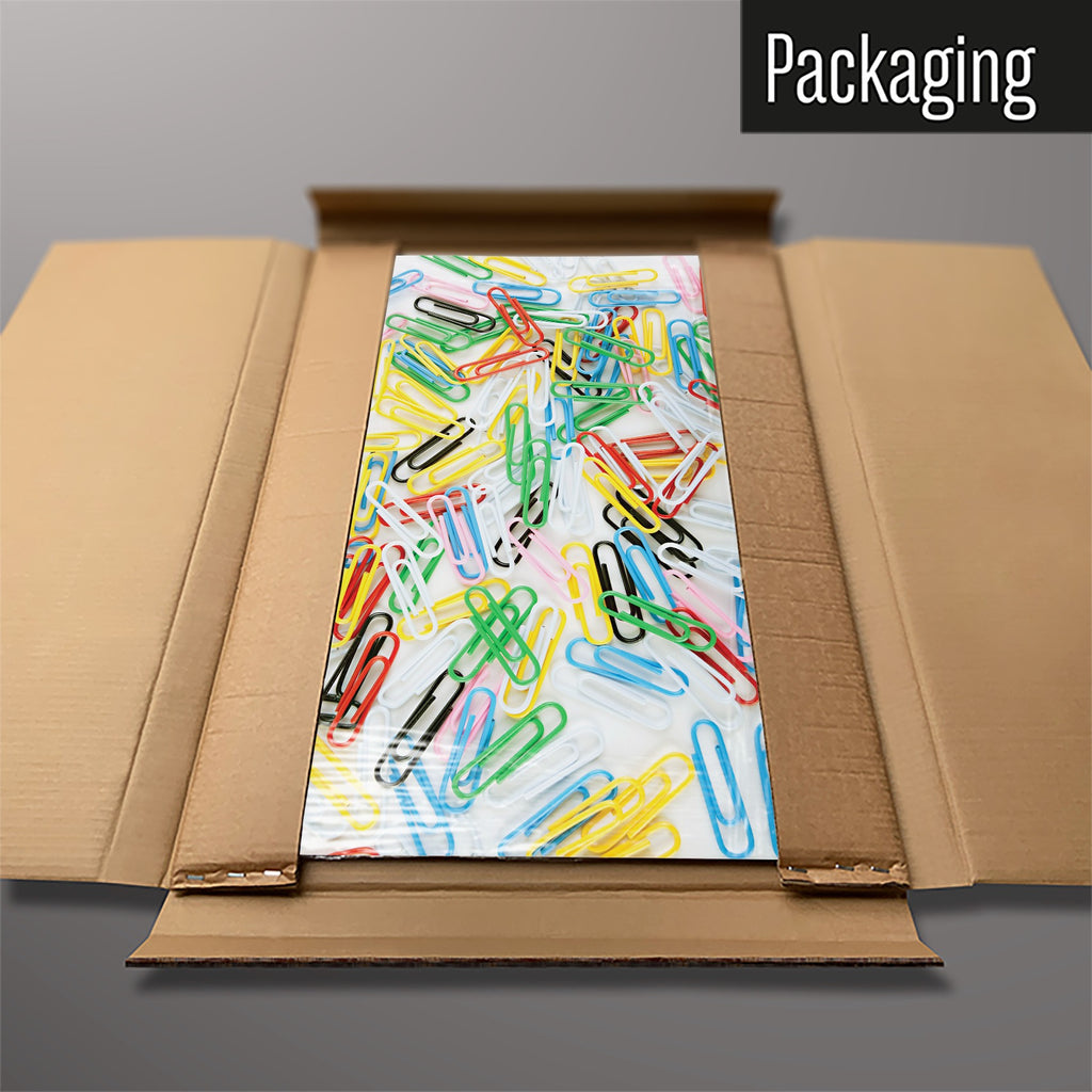 The Paper Clips magnetic notice board in Paper Clips packed flat in its cardboard box