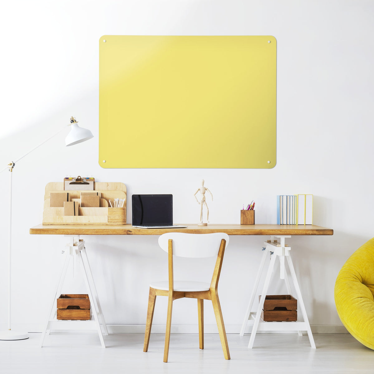 Plain Yellow magnetic notice board above a desk in a home office