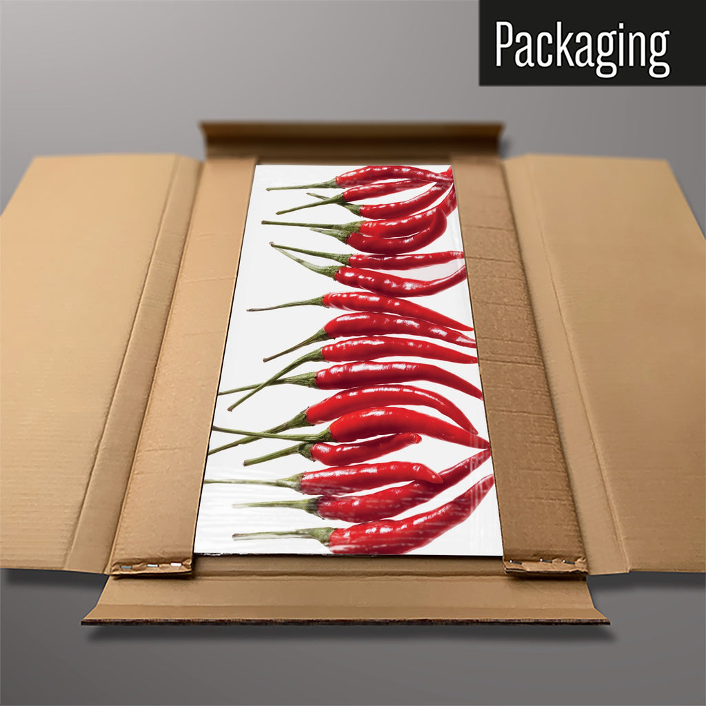 The Red Chillies magnetic notice board in Red Chillies packed flat in its cardboard box