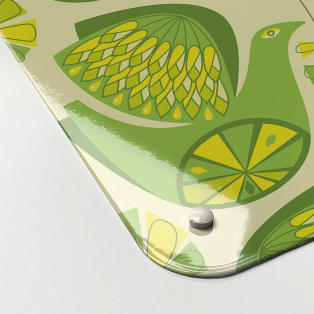 Close-up of the corner of the Retro Bird Pattern magnetic notice board in Citrus Bird Lemon & Lime, showing the gloss finish and a screw cap