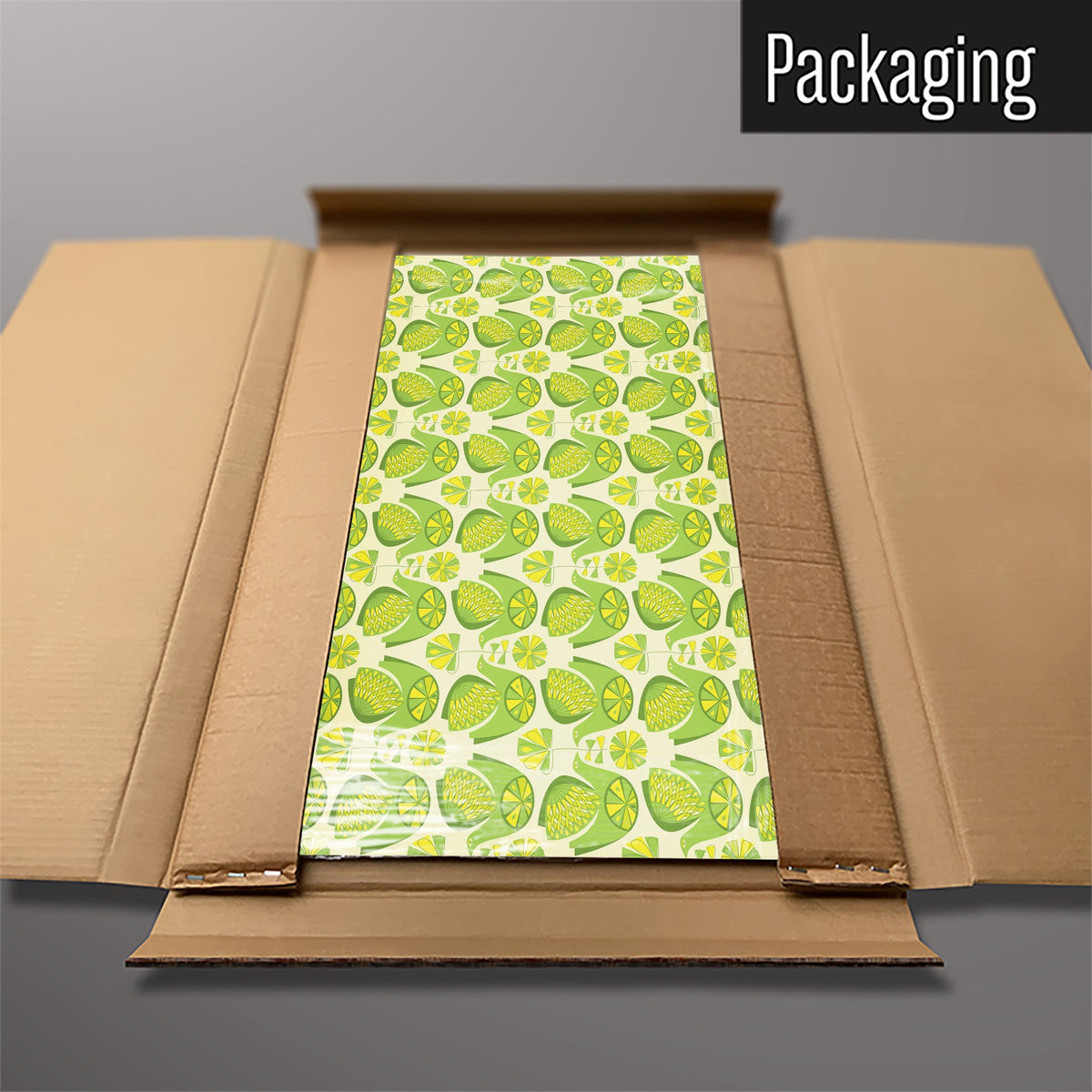 The Retro Bird Pattern magnetic notice board in Citrus Bird Lemon & Lime packed flat in its cardboard box