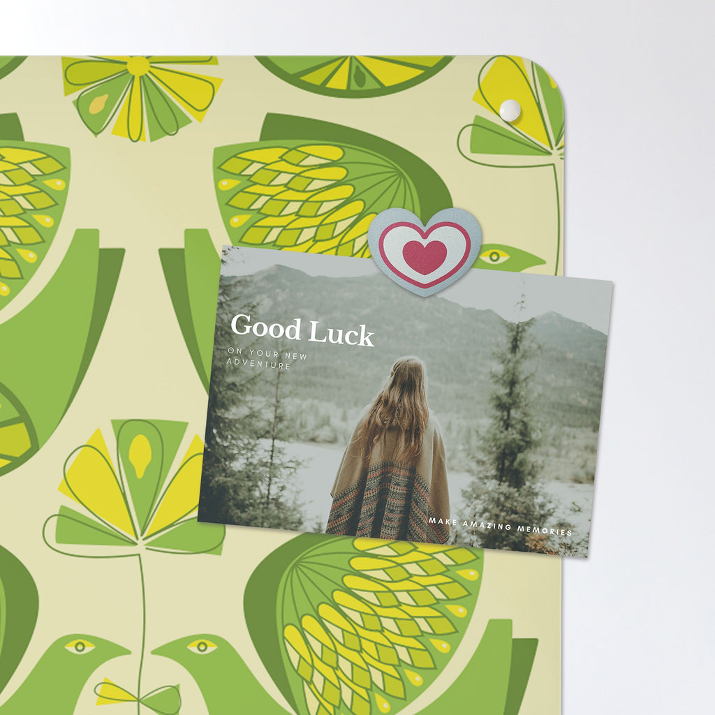 A postcard held by a fridge magnet on the Retro Bird Pattern magnetic notice board in Citrus Bird Lemon & Lime