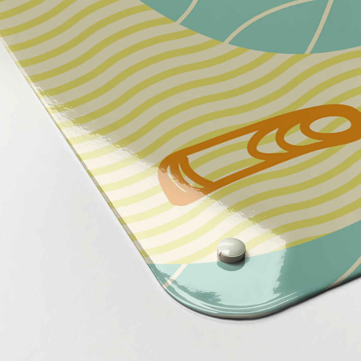 Close-up of the corner of the Sandcastles magnetic notice board, showing the gloss finish and a screw cap