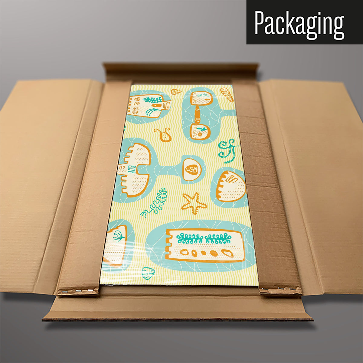 The Sandcastles magnetic notice board packed flat in its cardboard box