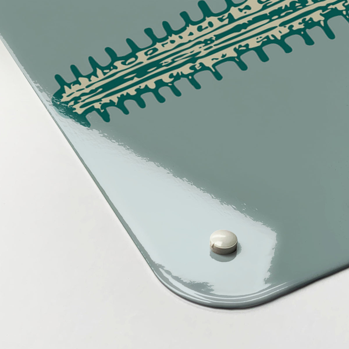 Close-up of the corner of the Sea Life Illustrations magnetic notice board in Fish Illustration, showing the gloss finish and a screw cap