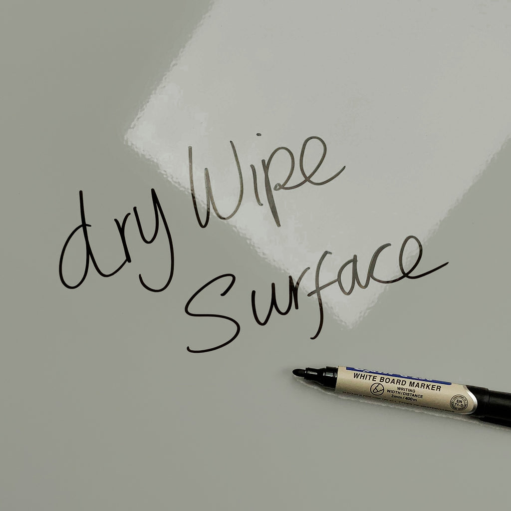 The words dry wipe surface written in marker pen on the Concrete and Yellow Shards Design magnetic notice board