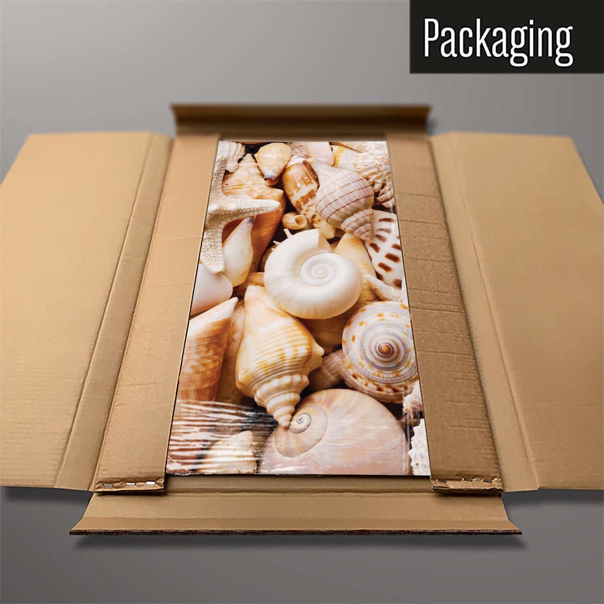 The Shells magnetic notice board in Shells packed flat in its cardboard box