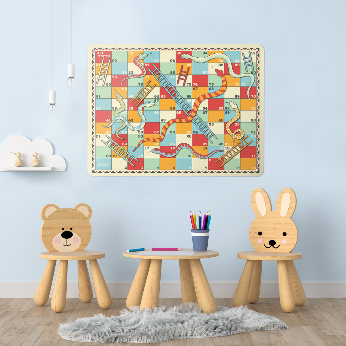 Snakes And Ladders magnetic notice board in Snakes and Ladders on the wall of a children's room