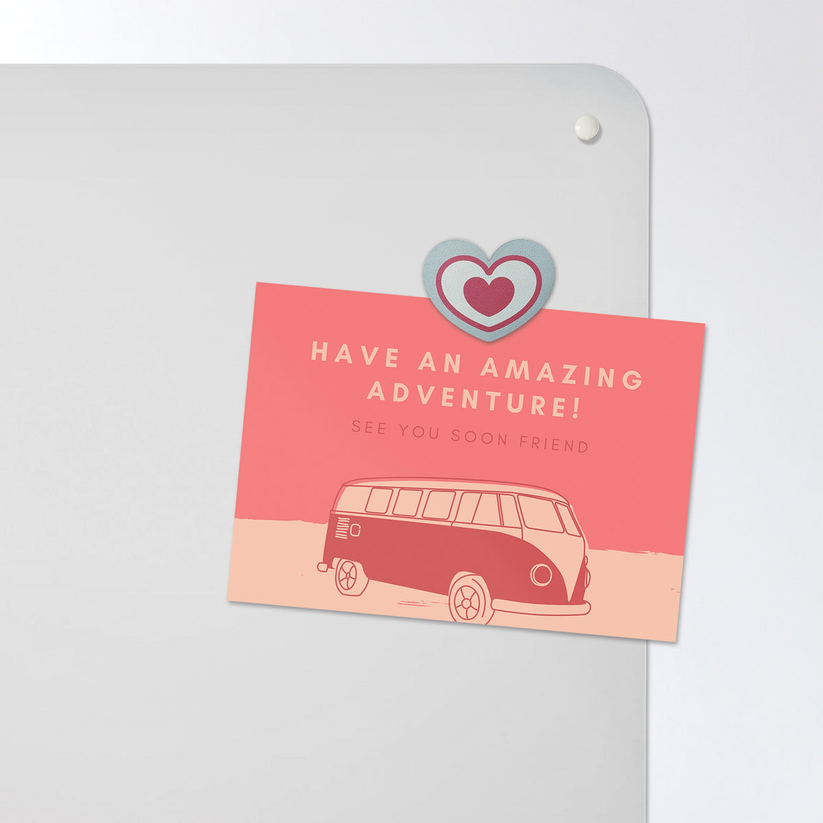 A postcard held by a fridge magnet on the Snowboarding magnetic notice board