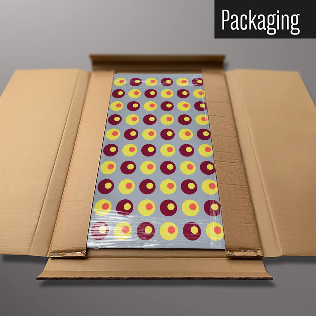 The Spots magnetic notice board in Spots on Grey packed flat in its cardboard box