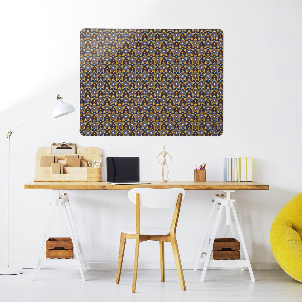 Stars magnetic notice board in purple above a desk in a home office