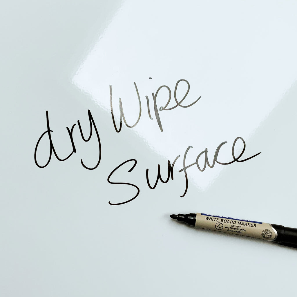The words dry wipe surface written in marker pen on the Statue Of Liberty magnetic notice board