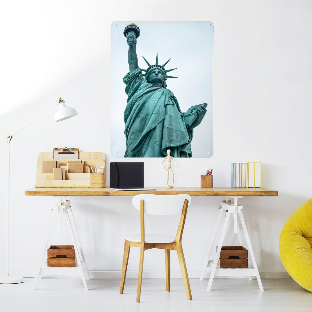Statue Of Liberty magnetic notice board above a desk in a home office