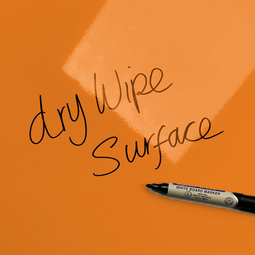 The words dry wipe surface written in marker pen on the Stripes - Pumpkin Stripes magnetic notice board
