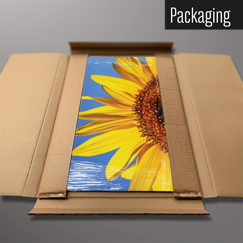 The Sunflower magnetic notice board in Sunflower packed flat in its cardboard box