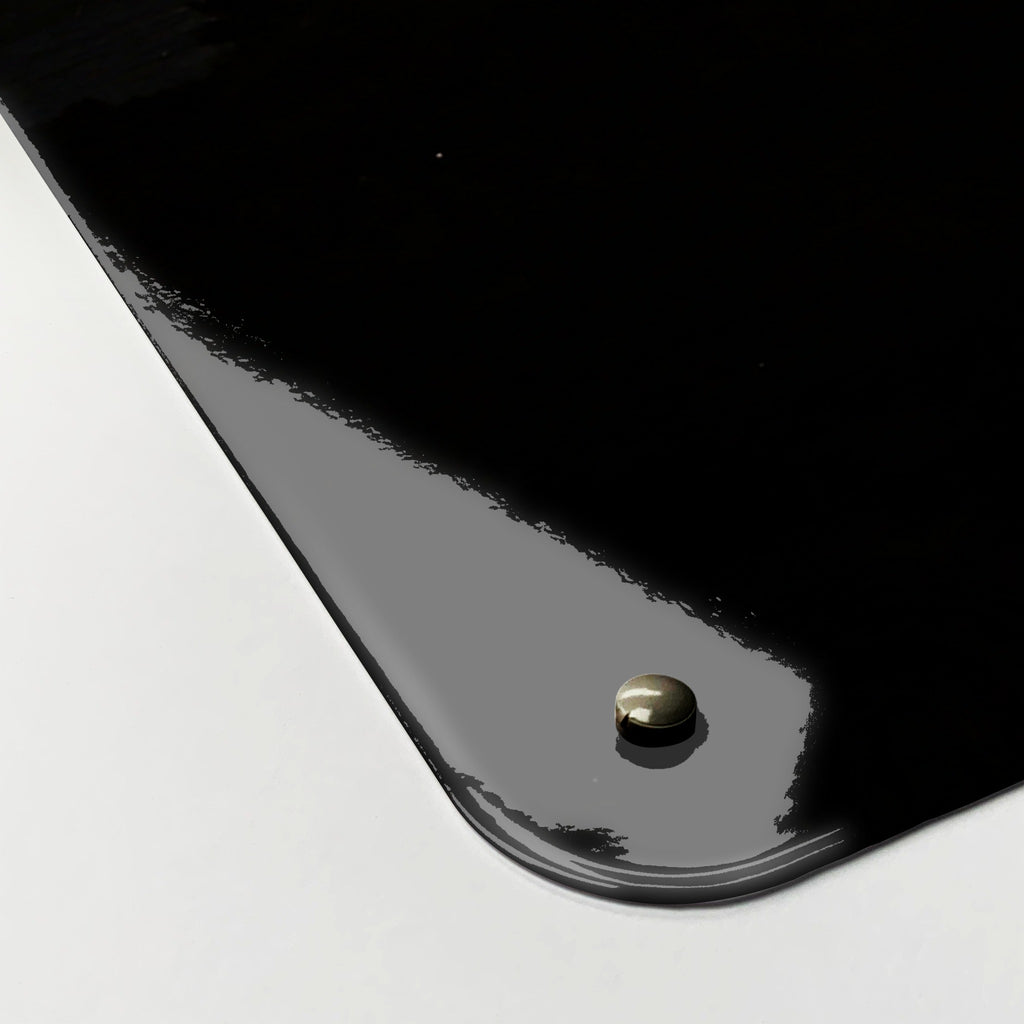 Close-up of the corner of the Sunset Horse magnetic notice board, showing the gloss finish and a screw cap