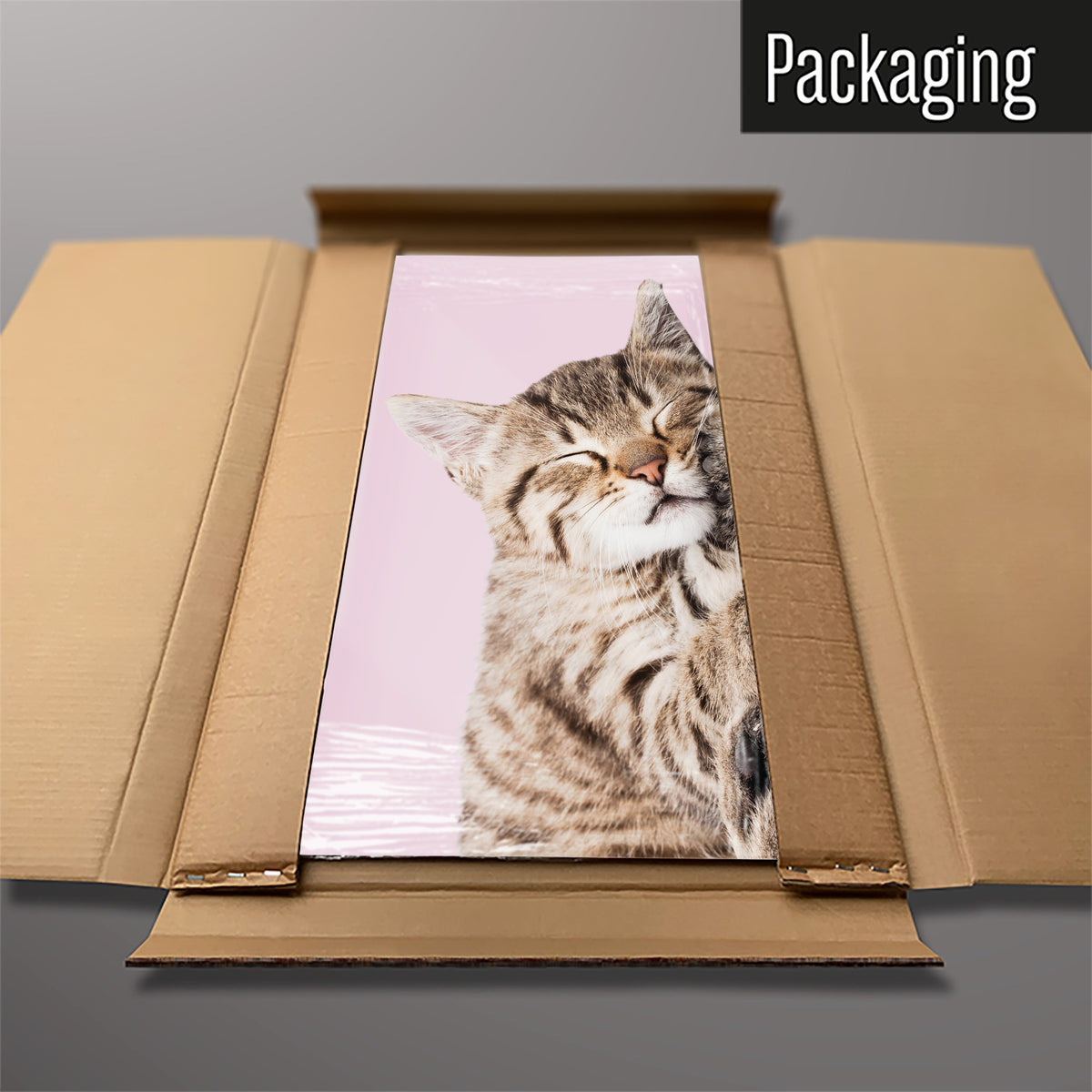 The Tabby Kitten magnetic notice board in Tabby Kitten packed flat in its cardboard box
