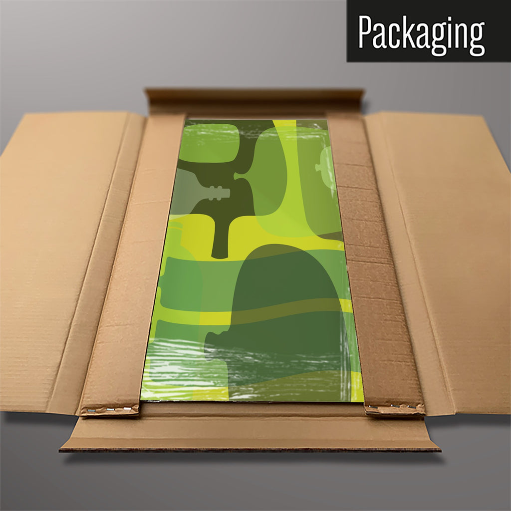 The Ten Bottles magnetic notice board in Green packed flat in its cardboard box
