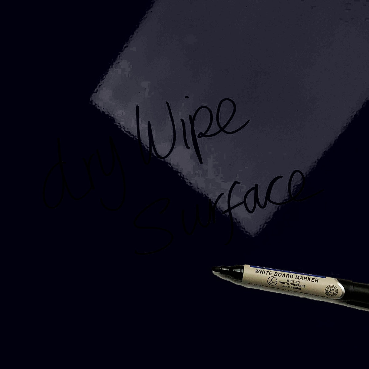 The words dry wipe surface written in marker pen on the Tiger magnetic notice board