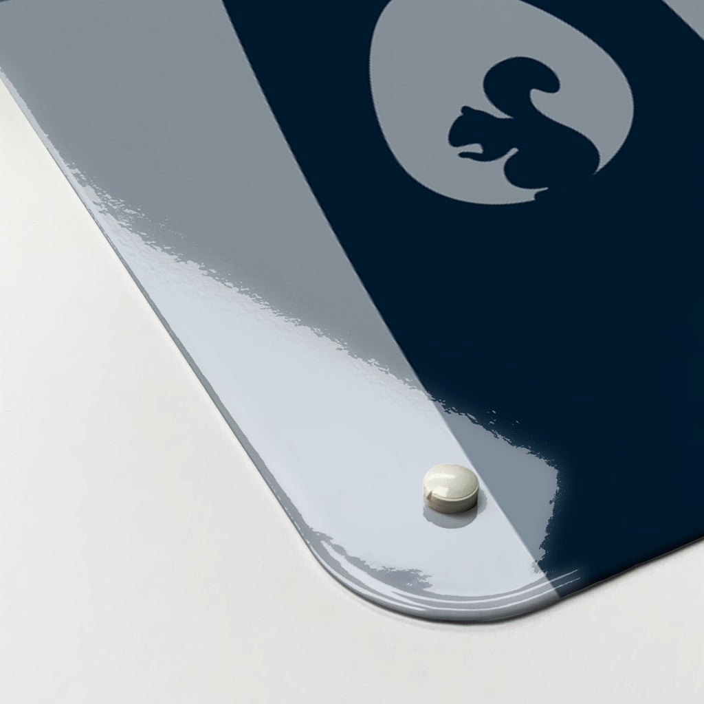 Close-up of the corner of the Tree Houses magnetic notice board in blue, showing the gloss finish and a screw cap