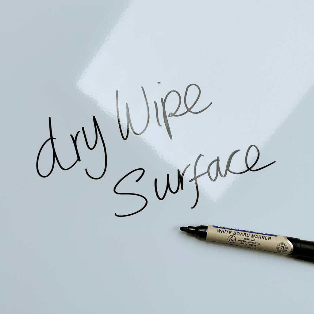 The words dry wipe surface written in marker pen on the Wave magnetic notice board