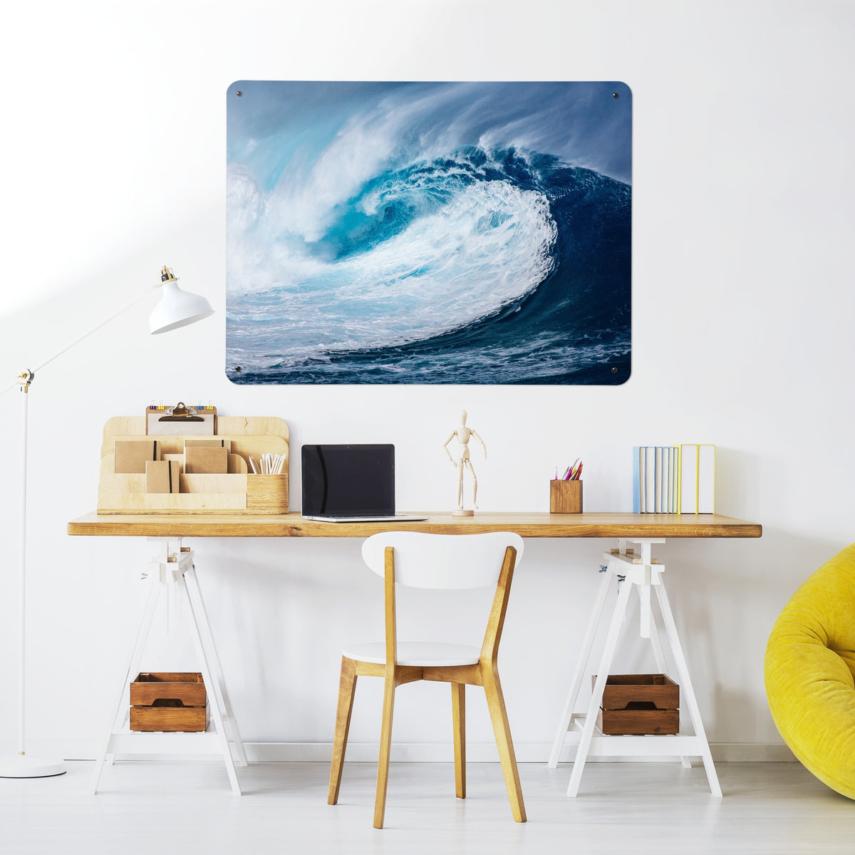 Wave magnetic notice board above a desk in a home office