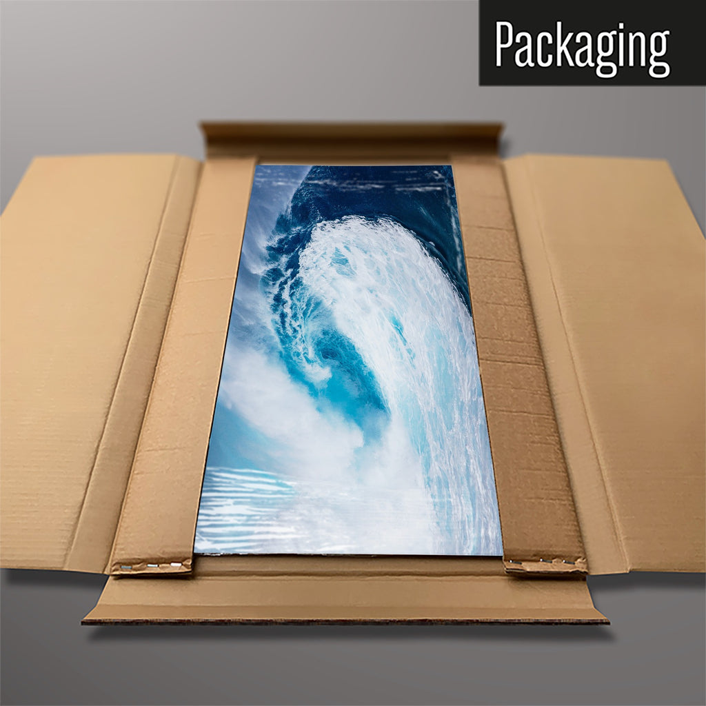The Wave magnetic notice board packed flat in its cardboard box