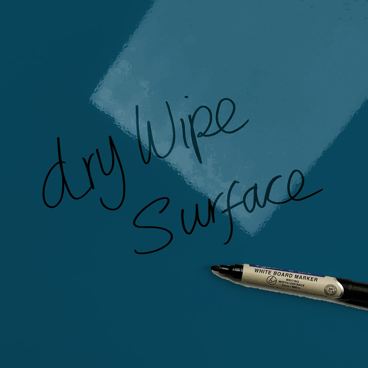The words dry wipe surface written in marker pen on the Waves On The Shore magnetic notice board